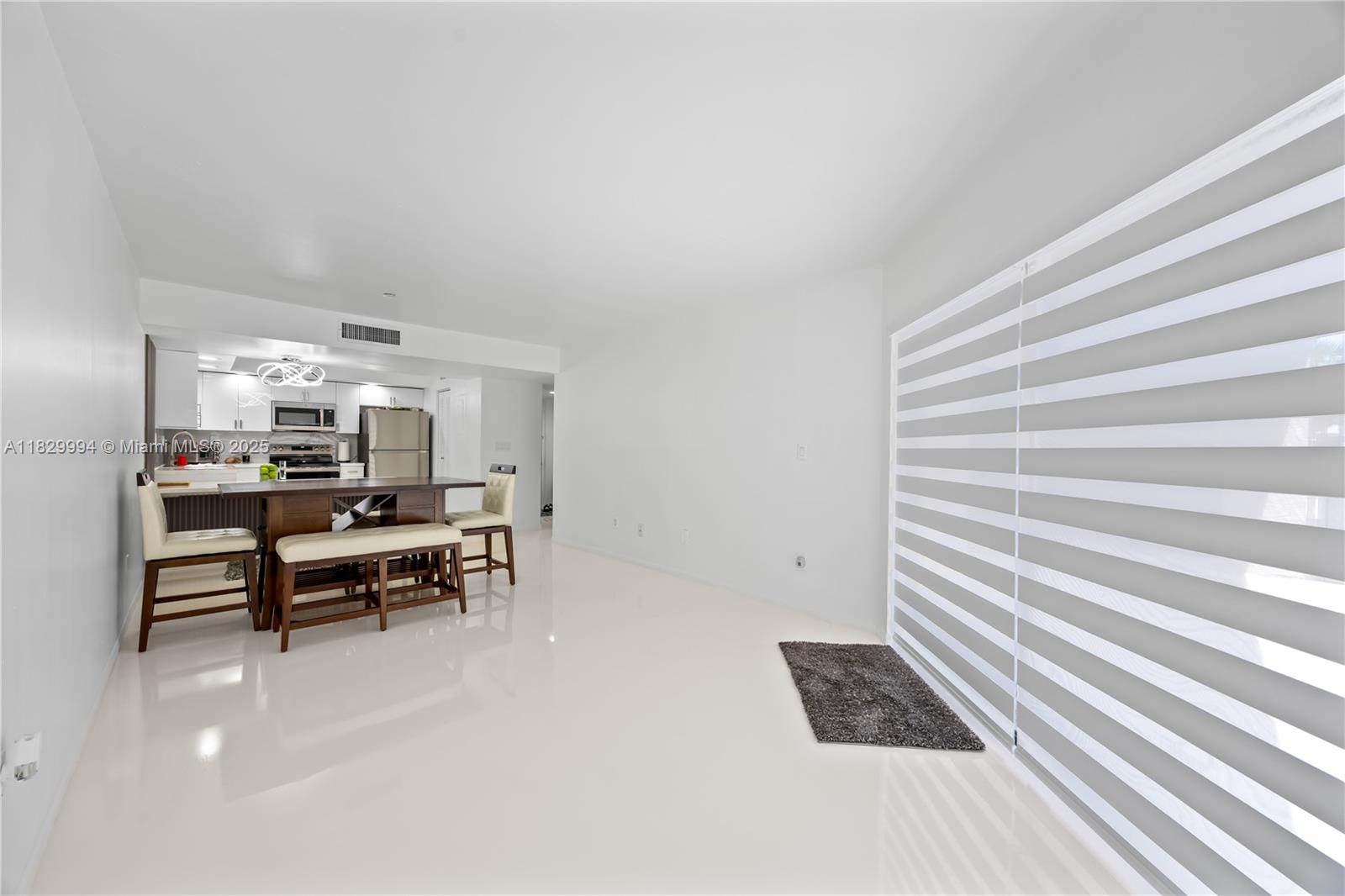8810 Southwest 132nd Place, Unit 101DN Miami, FL 33186 - Photo 26 of 39 a view of a workspace with furniture