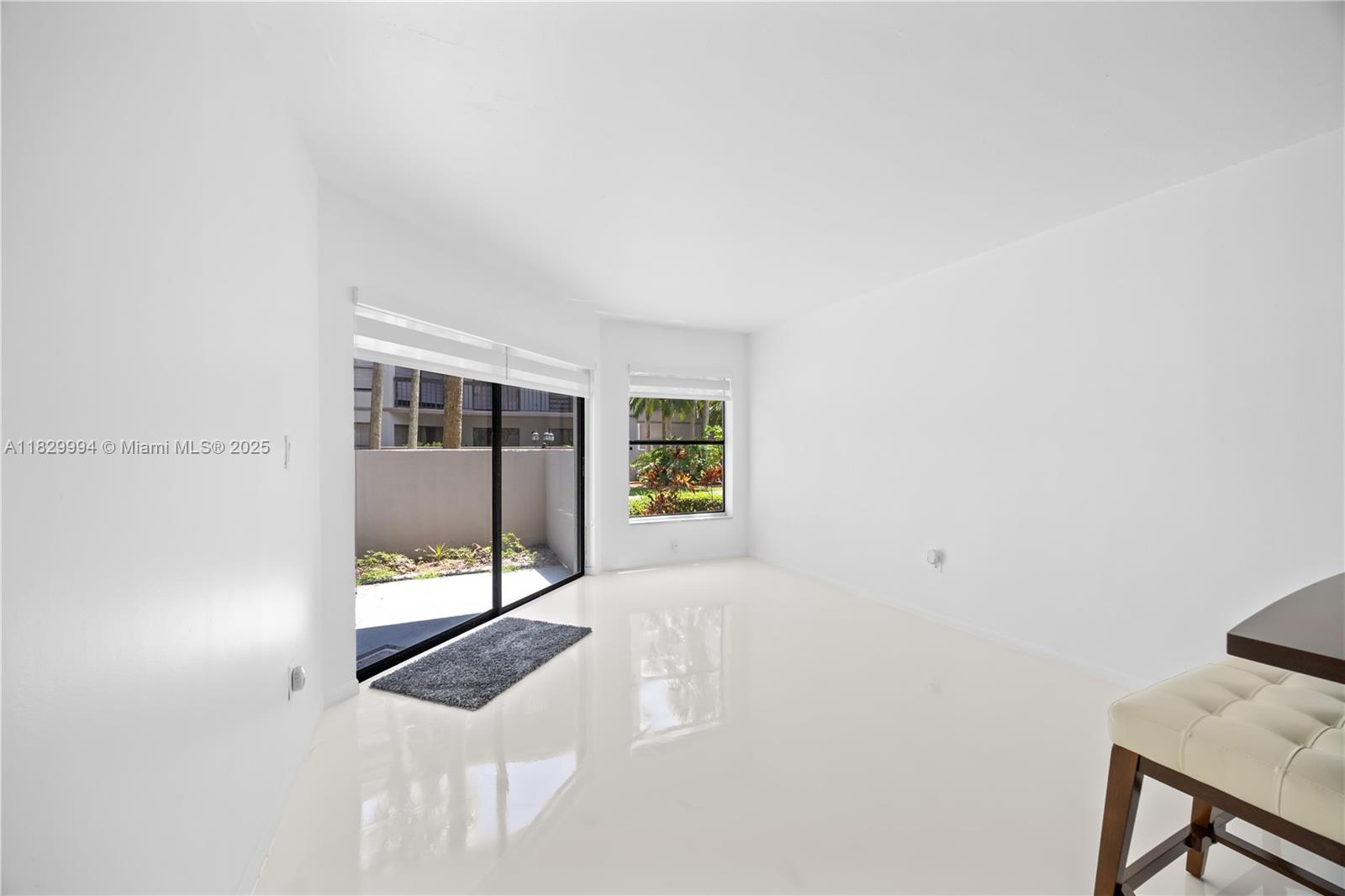 8810 Southwest 132nd Place, Unit 101DN Miami, FL 33186 - Photo 29 of 39 a view of an empty room