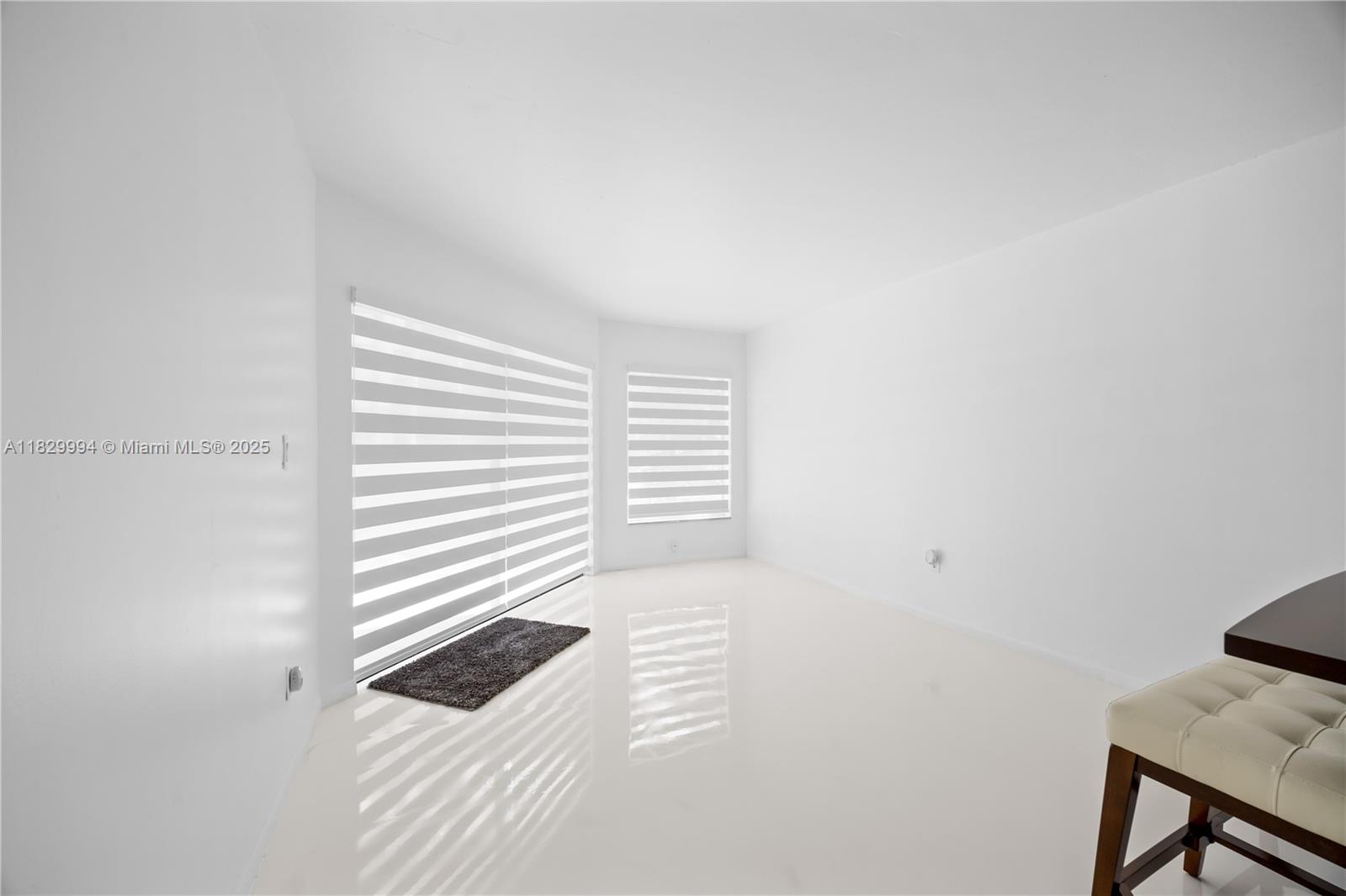 8810 Southwest 132nd Place, Unit 101DN Miami, FL 33186 - Photo 30 of 39 a bathroom with a sink and a window