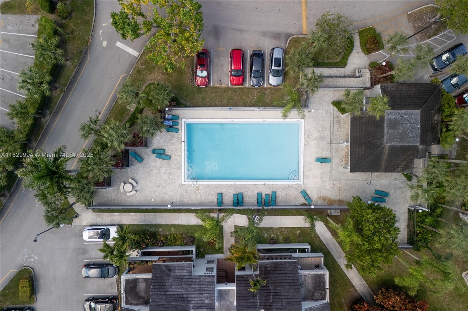 8810 Southwest 132nd Place, Unit 101DN Miami, FL 33186 - Photo 35 of 39 an aerial view of a house with outdoor space