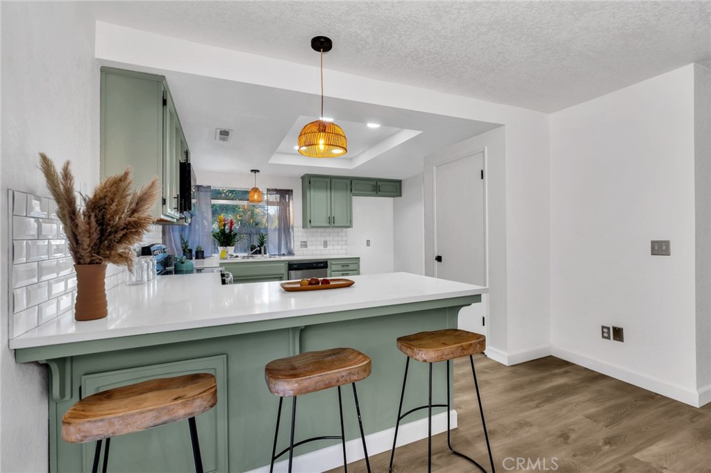 848 Lehigh Drive Merced, CA 95348 - Photo 9 of 30 a view of kitchen island with stainless steel appliances granite countertop sink and stove