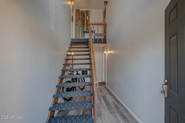 a view of entryway with wooden floor