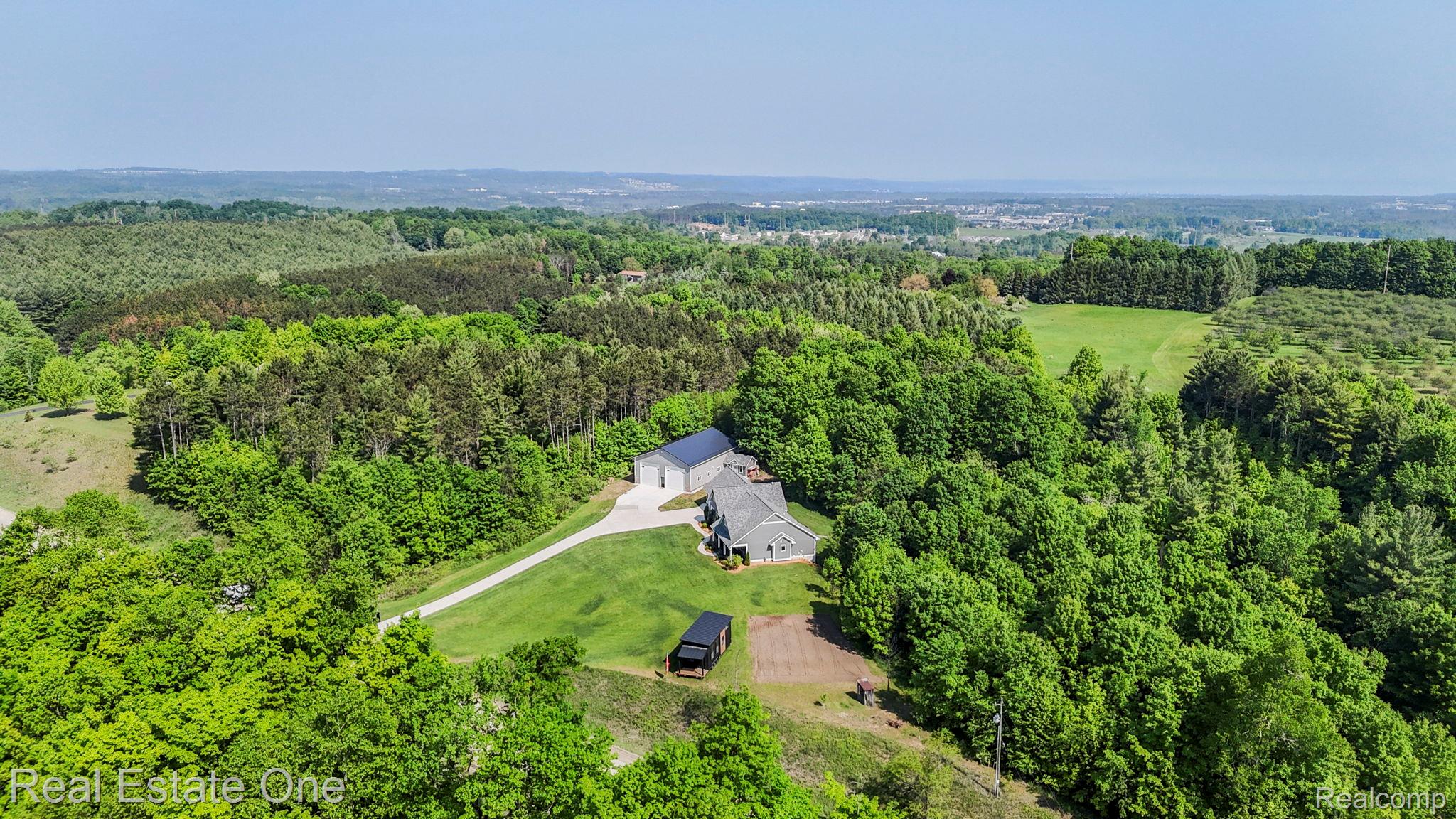 802 West Potter Road Traverse City, MI 49696 - Photo 5 of 83 4-web-or-mls-DJI_20250605105557_0306_D.JPG