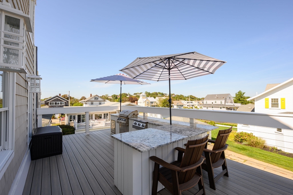 133 Beach Avenue Hull, MA 02045 - Photo 28 of 42 a view of a terrace with furniture