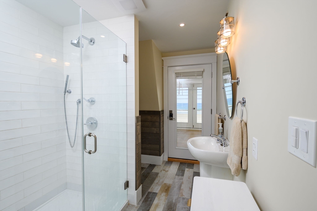 133 Beach Avenue Hull, MA 02045 - Photo 31 of 42 a bathroom with a toilet sink and shower