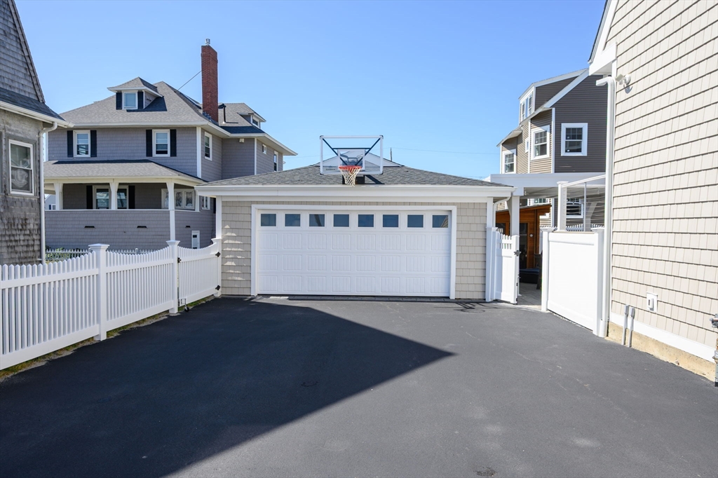 133 Beach Avenue Hull, MA 02045 - Photo 36 of 42 a front view of a house with yard
