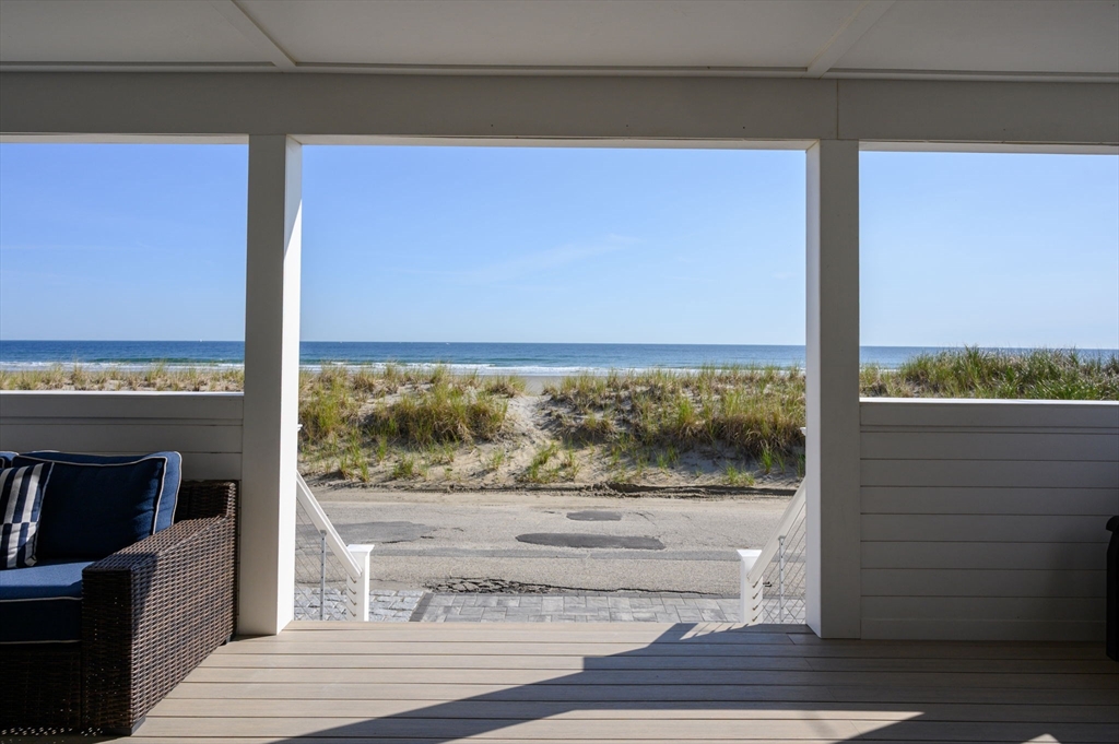 133 Beach Avenue Hull, MA 02045 - Photo 5 of 42 a view of a floor to ceiling window and an outdoor view