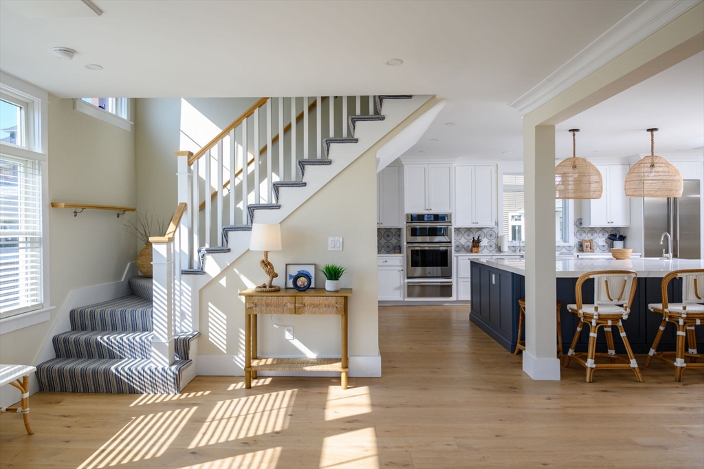 133 Beach Avenue Hull, MA 02045 - Photo 6 of 42 a view of a living room and entry way