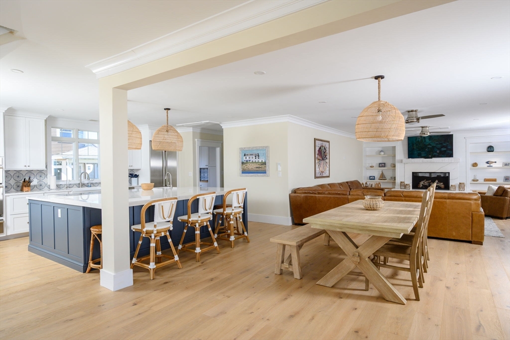 133 Beach Avenue Hull, MA 02045 - Photo 7 of 42 a view of a dining room with furniture window and wooden floor