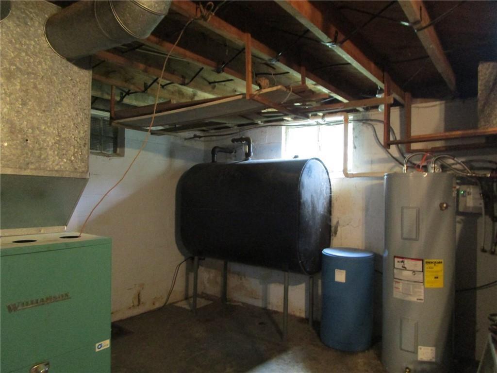 26071 State Rte 27 Guys Mills, PA 16327 - Photo 12 of 16 a view of a water heater room