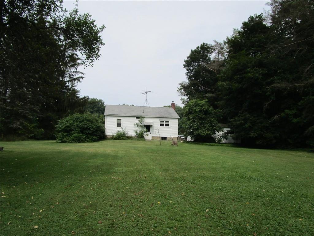 26071 State Rte 27 Guys Mills, PA 16327 - Photo 15 of 16 a view of a big house with a big yard and large trees