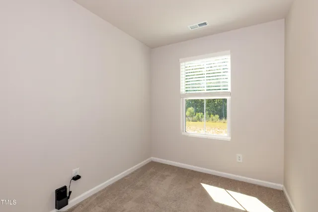 an empty room with a window