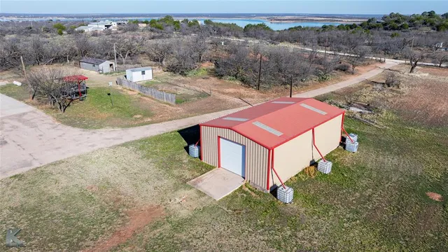 a view of a houses with a yard