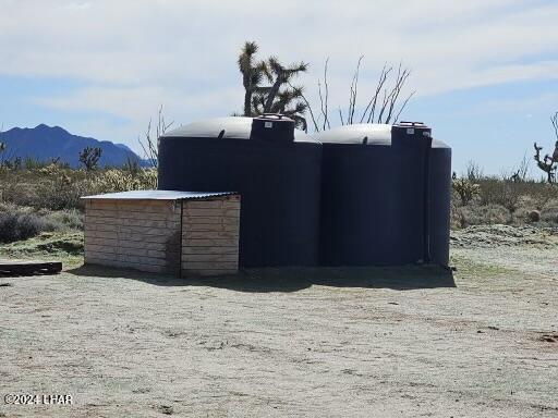 3252 South Dale Evans Road Yucca, AZ 86438 - Photo 11 of 19 Water containers