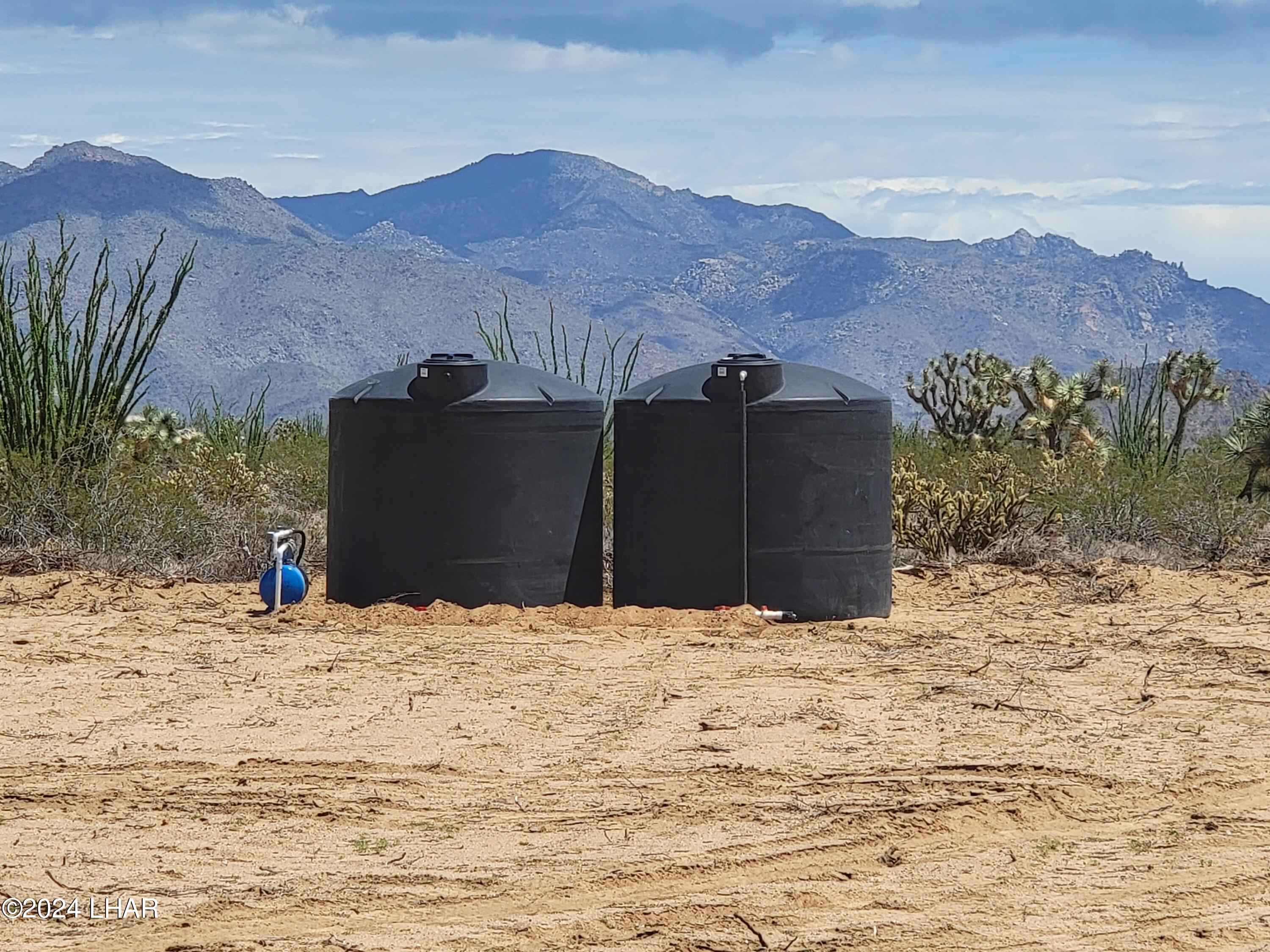 3252 South Dale Evans Road Yucca, AZ 86438 - Photo 10 of 19 Water containers