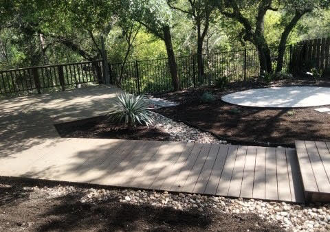 312 Sailmaster Street Lakeway, TX 78734 - Photo 16 of 19 a view of a backyard with large trees