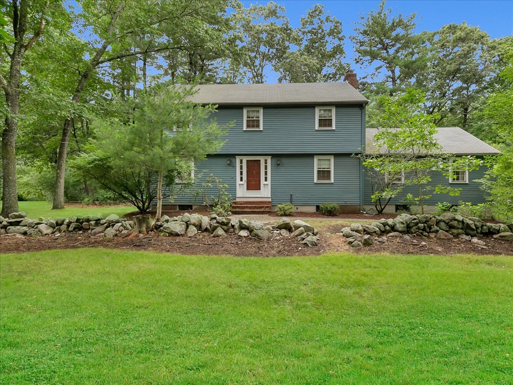 70 Parsonage Lane Topsfield, MA 01983 - Photo 2 of 29 a view of a house with a yard and sitting area