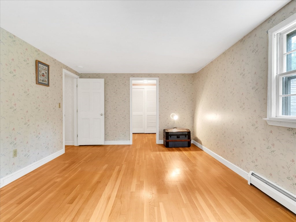 70 Parsonage Lane Topsfield, MA 01983 - Photo 26 of 29 a view of a room with a wooden floor