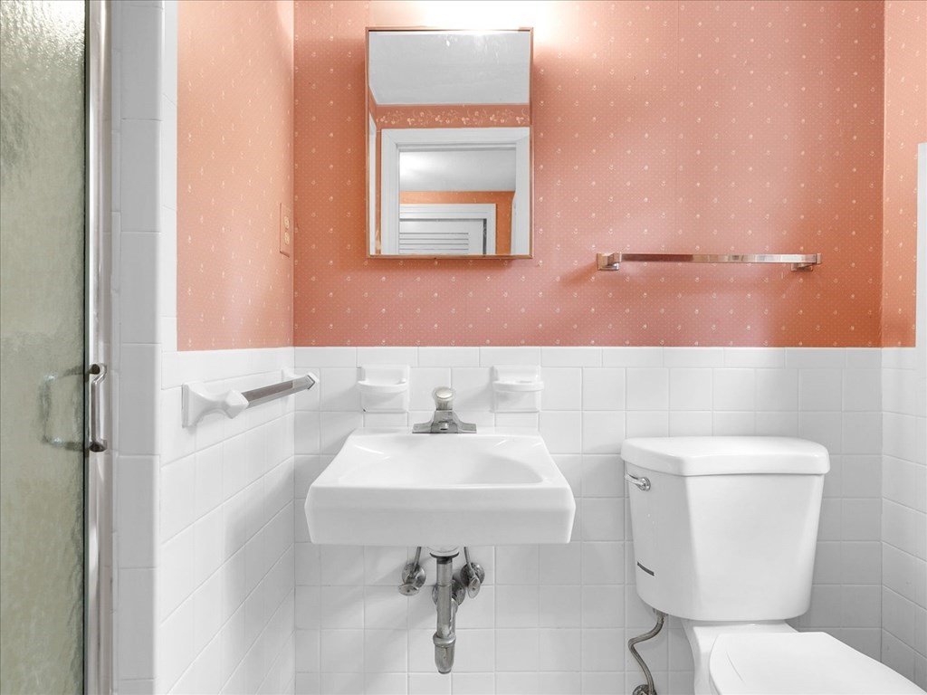 70 Parsonage Lane Topsfield, MA 01983 - Photo 27 of 29 a bathroom with a sink toilet and mirror