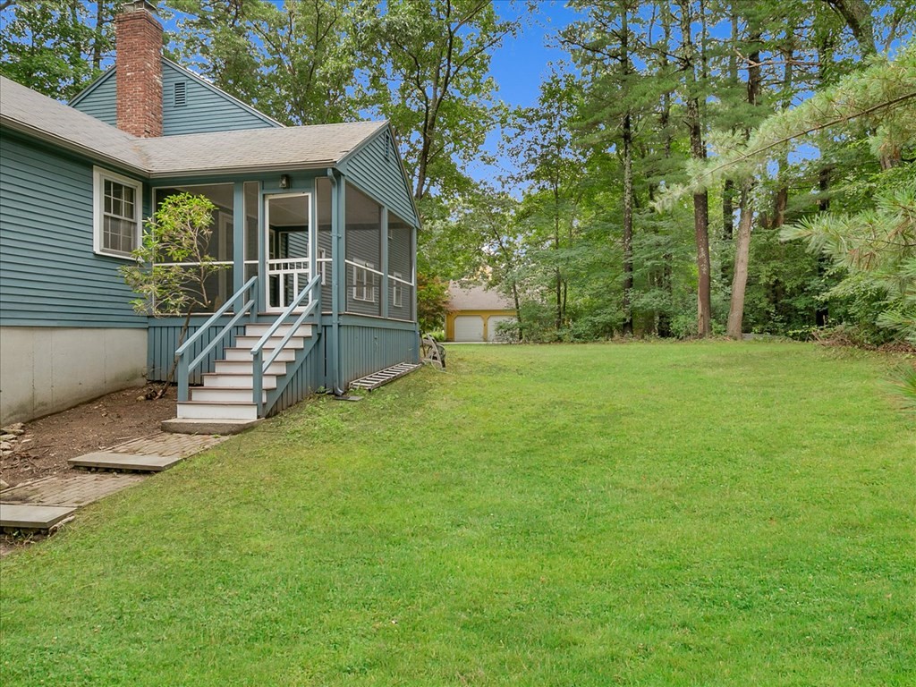 70 Parsonage Lane Topsfield, MA 01983 - Photo 4 of 29 a view of a house with a yard