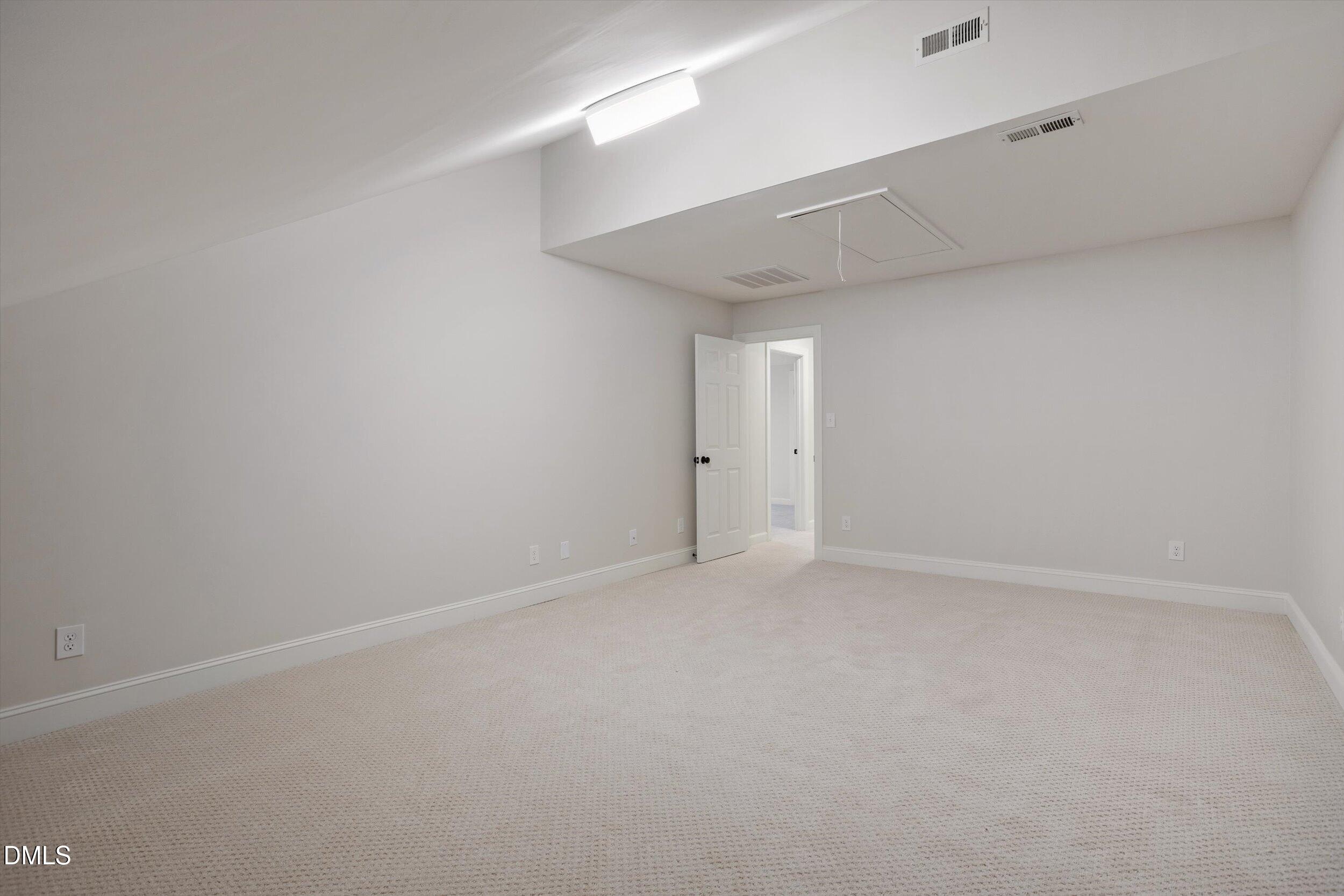 3417 Sir Colleton Court Raleigh, NC 27612 - Photo 38 of 46 Finished bonus room upstairs with endless possibilities, flex, office, movie room, crafts