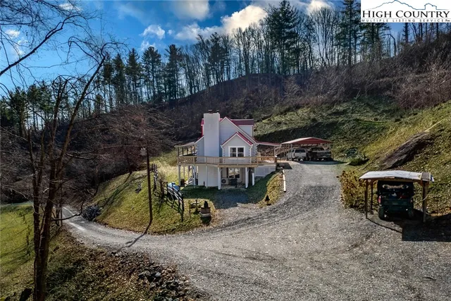 a view of a park with iron fence