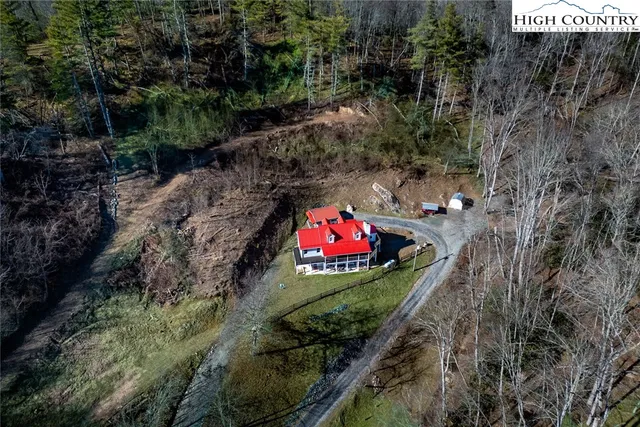 a view of a yard with an outdoor seating