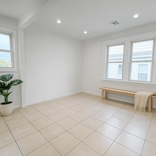 355 Princeton Avenue, Unit 2 Hillside, NJ 07205 - Photo 2 of 11 an empty room with windows