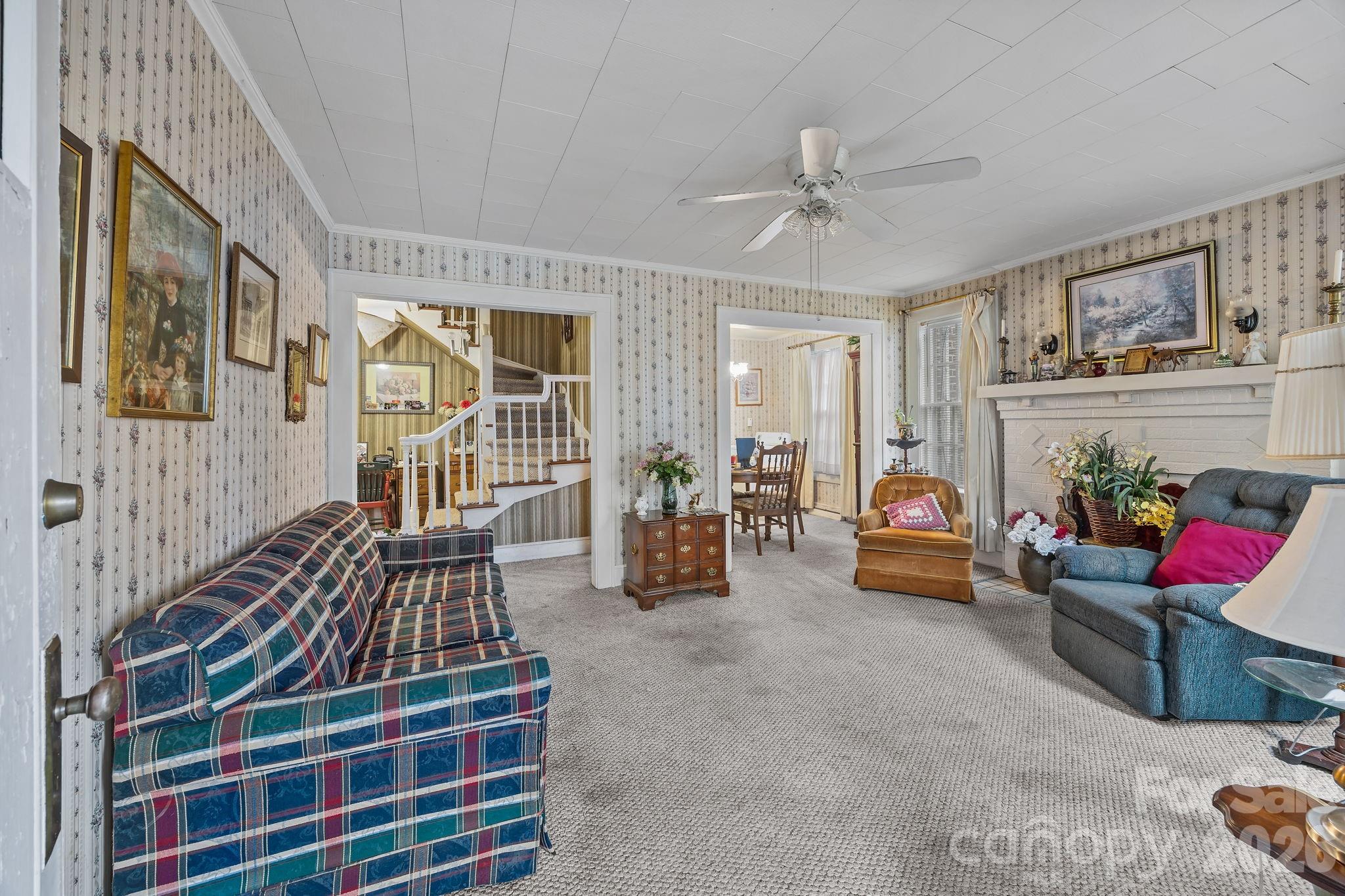 420 Spring Street Albemarle, NC 28001 - Photo 14 of 40 a living room with furniture and a rug