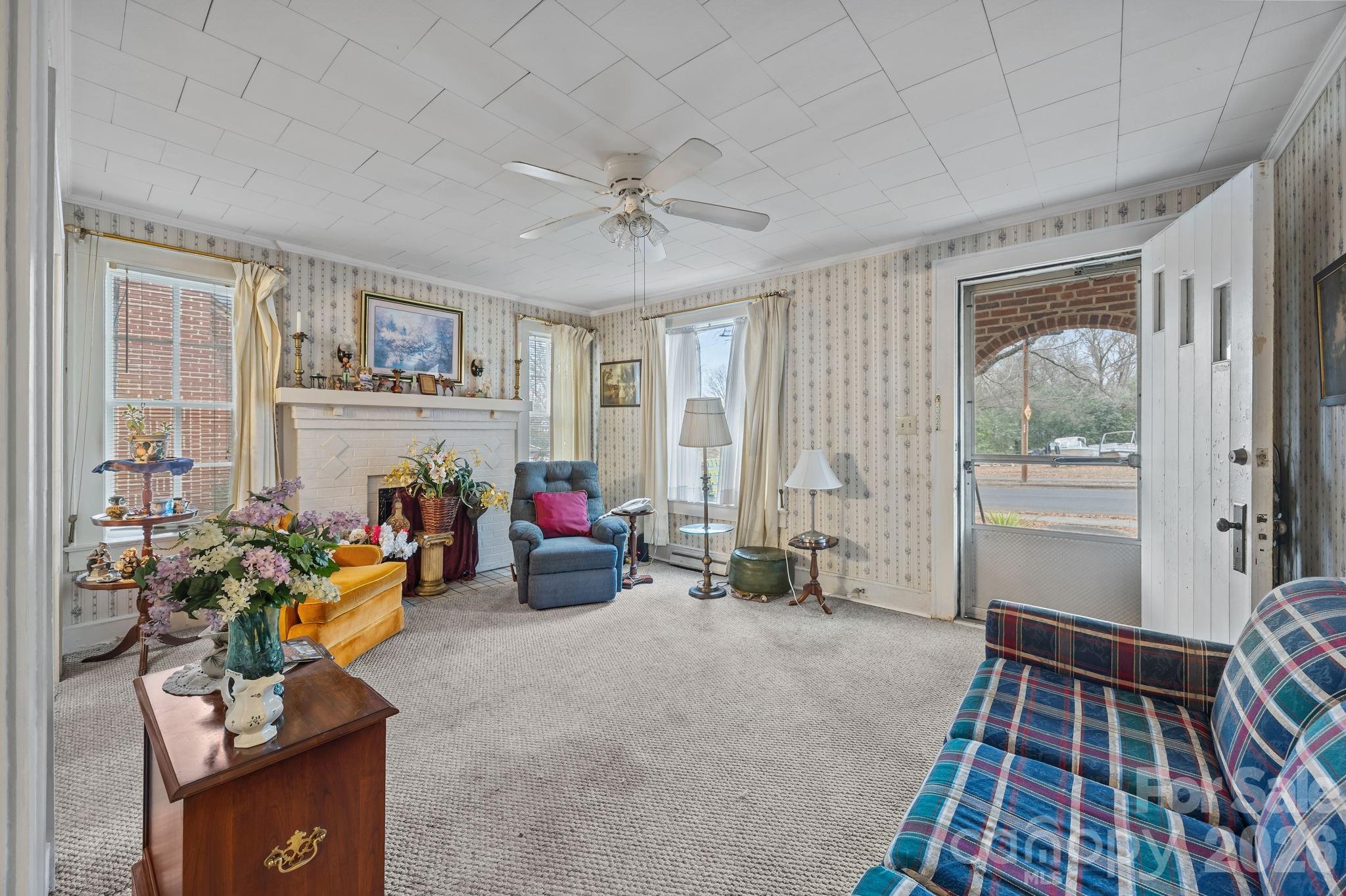 420 Spring Street Albemarle, NC 28001 - Photo 15 of 40 a living room with furniture and a window