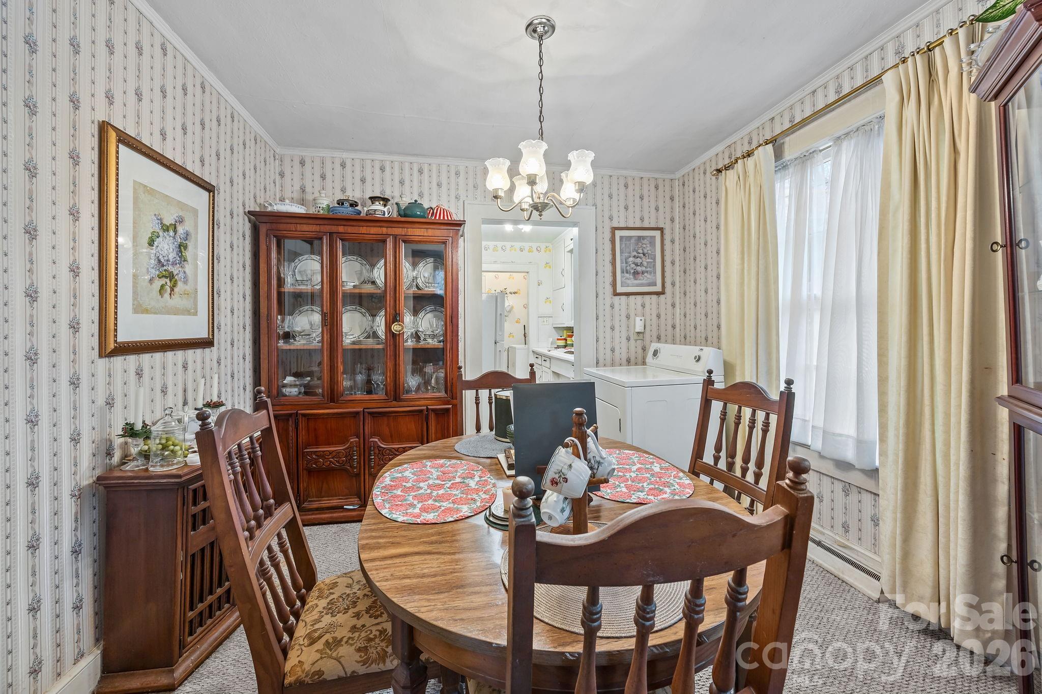 420 Spring Street Albemarle, NC 28001 - Photo 16 of 40 a view of a dining room with furniture window and outside view