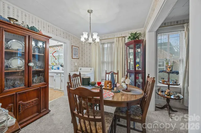 a kitchen with stainless steel appliances a sink and a refrigerator
