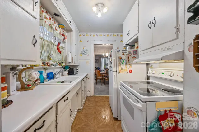 a view of storage and utility room with washer and dryer