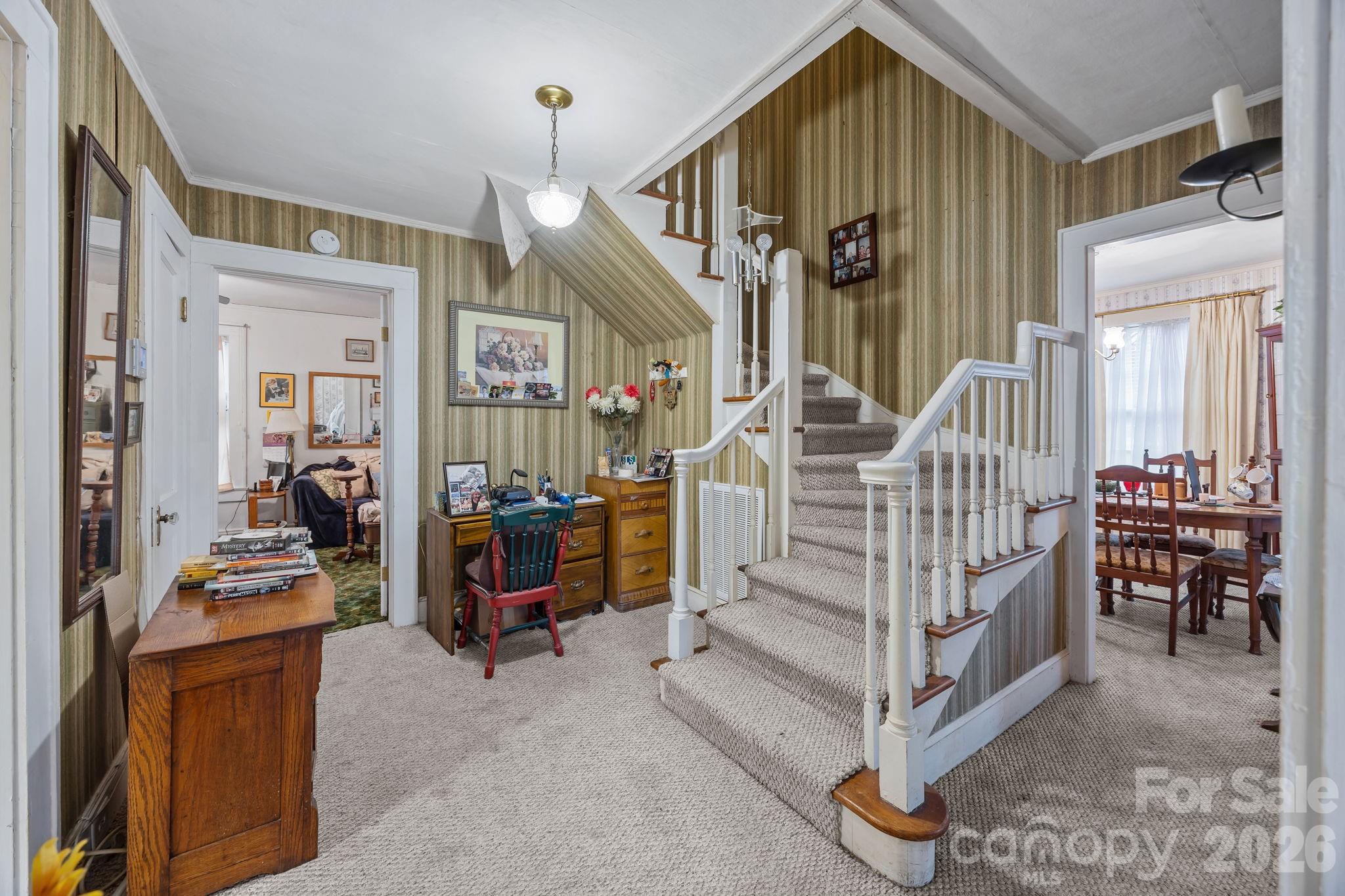 420 Spring Street Albemarle, NC 28001 - Photo 23 of 40 a view of front door with dining room