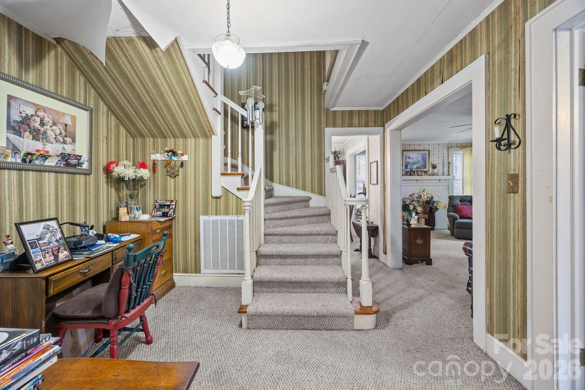 420 Spring Street Albemarle, NC 28001 - Photo 24 of 40 a view of entryway with stairs and furniture