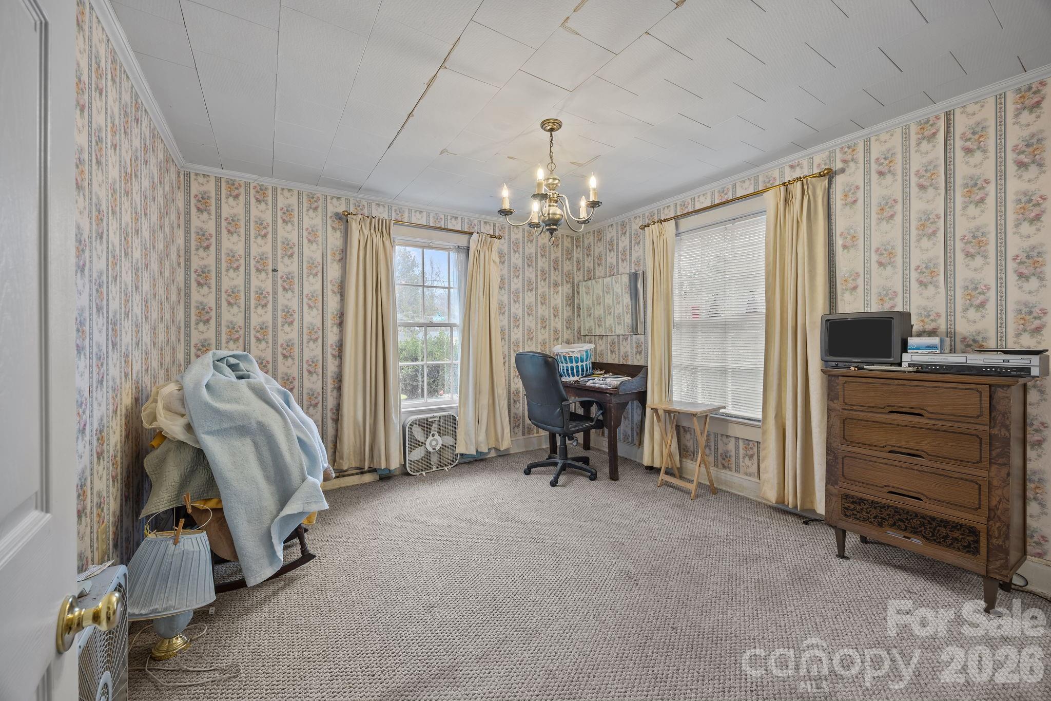 420 Spring Street Albemarle, NC 28001 - Photo 25 of 40 a view of a livingroom with furniture and a window
