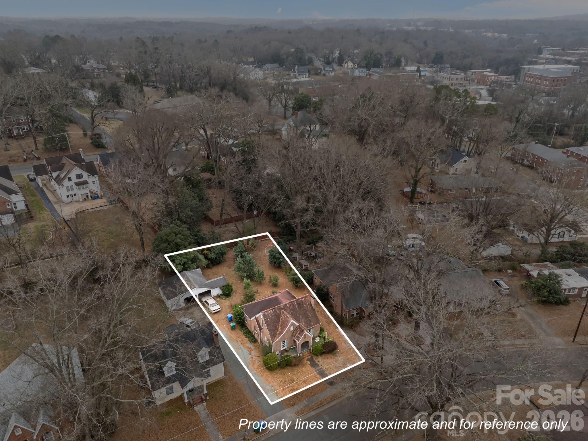 420 Spring Street Albemarle, NC 28001 - Photo 40 of 40 an aerial view of a house with a yard