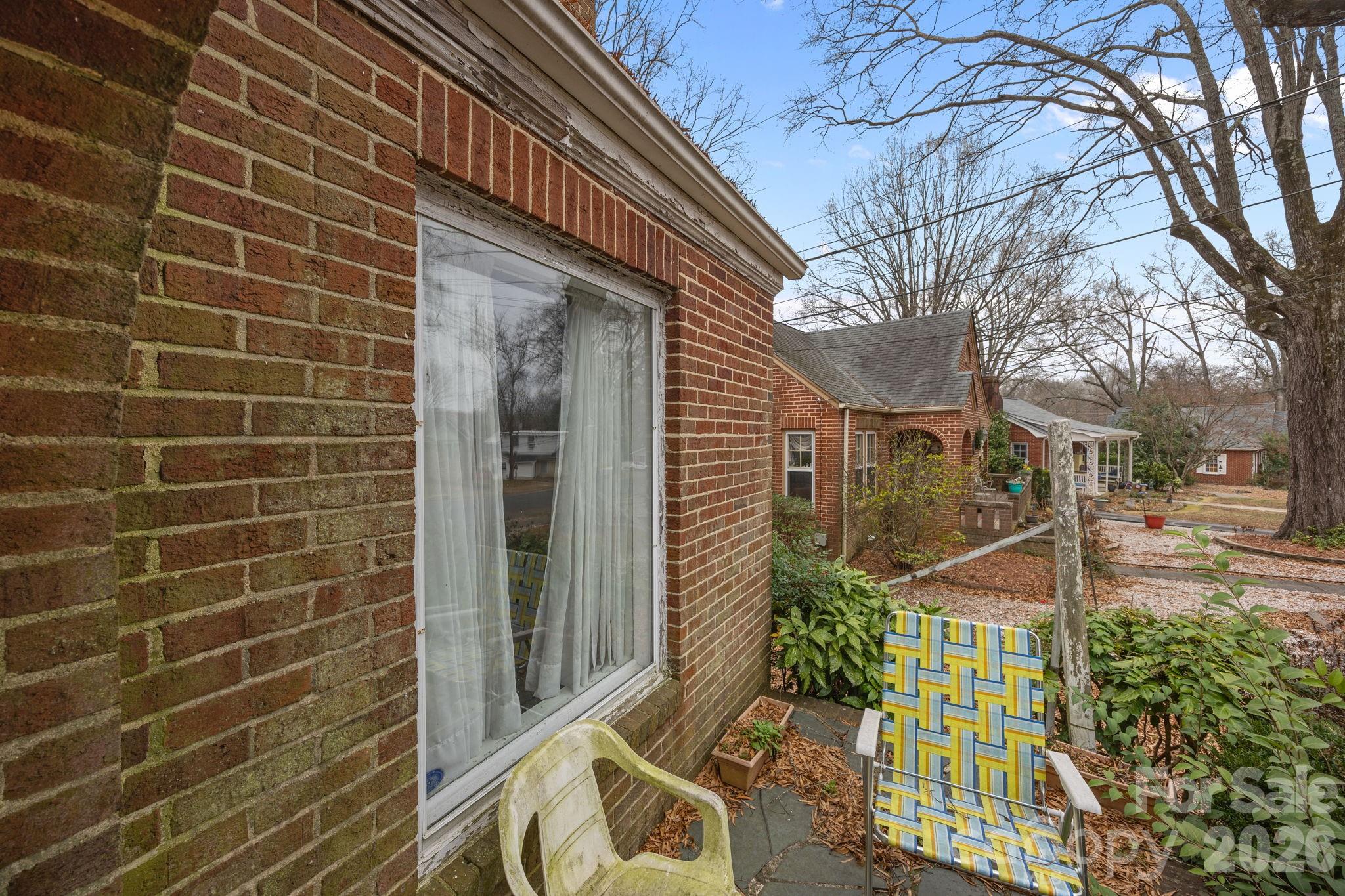 420 Spring Street Albemarle, NC 28001 - Photo 8 of 40 a view of a patio with iron fence