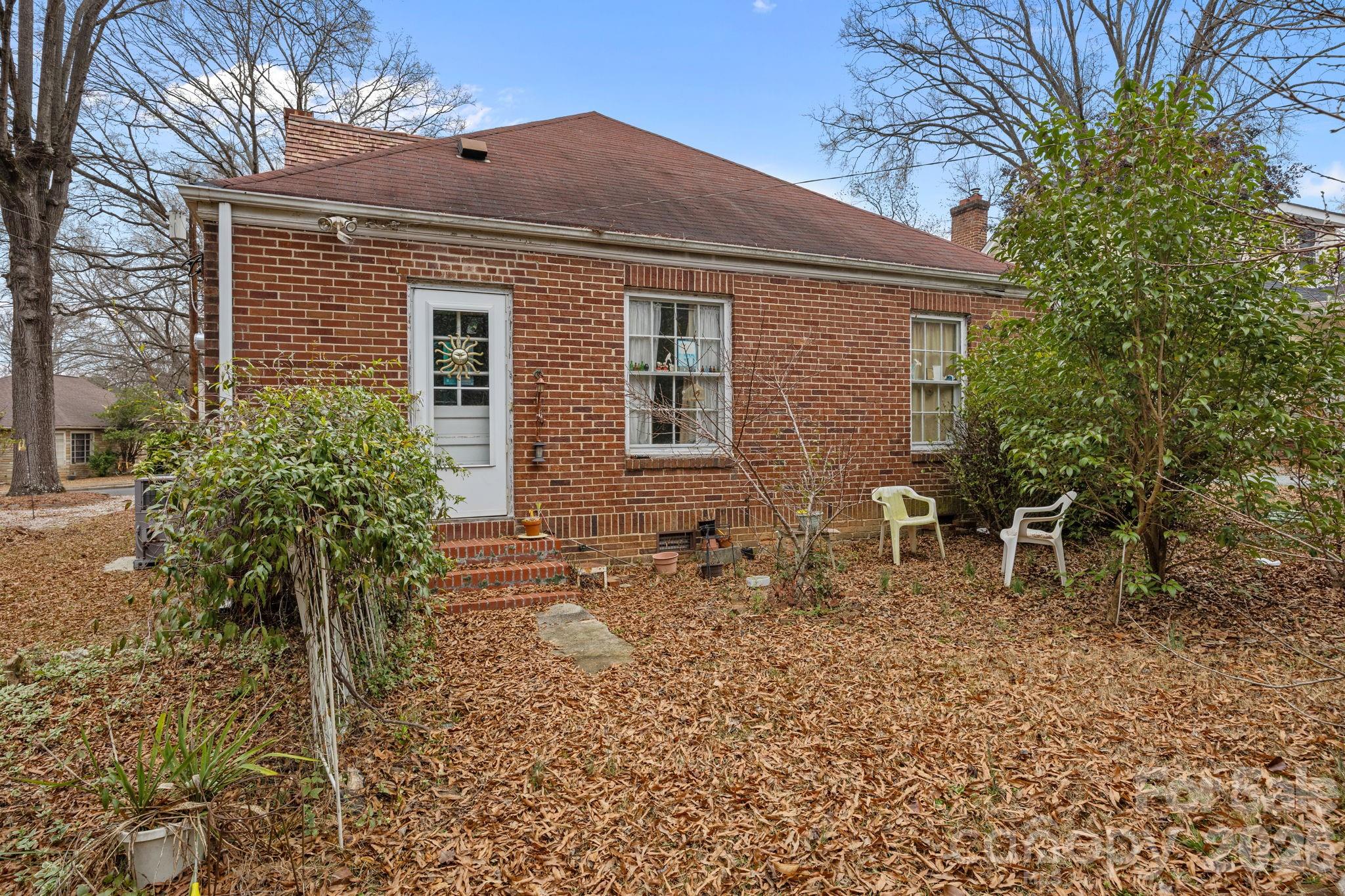 420 Spring Street Albemarle, NC 28001 - Photo 10 of 40 a front view of house with small garden