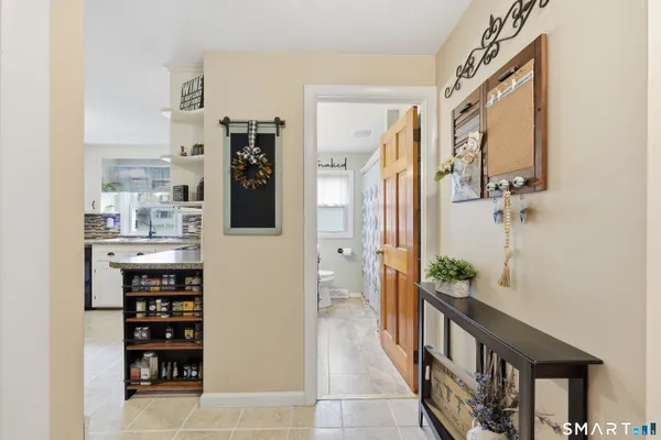 a view of a hallway and a dining room view