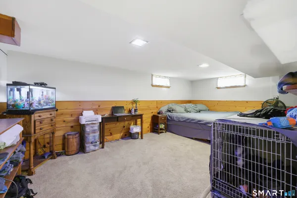 a room with lots of furniture and clutter