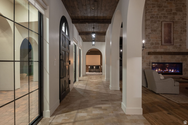 4871 South Homestead Way Washington, UT 84780 - Photo 101 of 151 Corridor featuring arched walkways and wooden ceiling