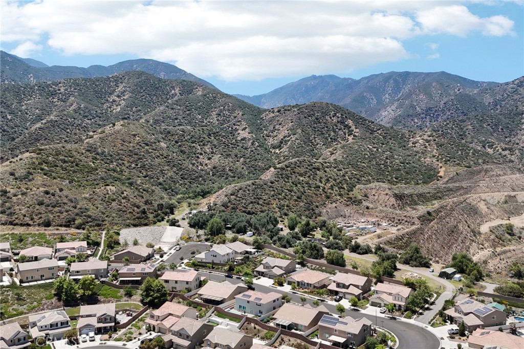 11056 Guffey Ranch Way Corona, CA 92883 - Photo 53 of 61 an aerial view of residential houses with outdoor space