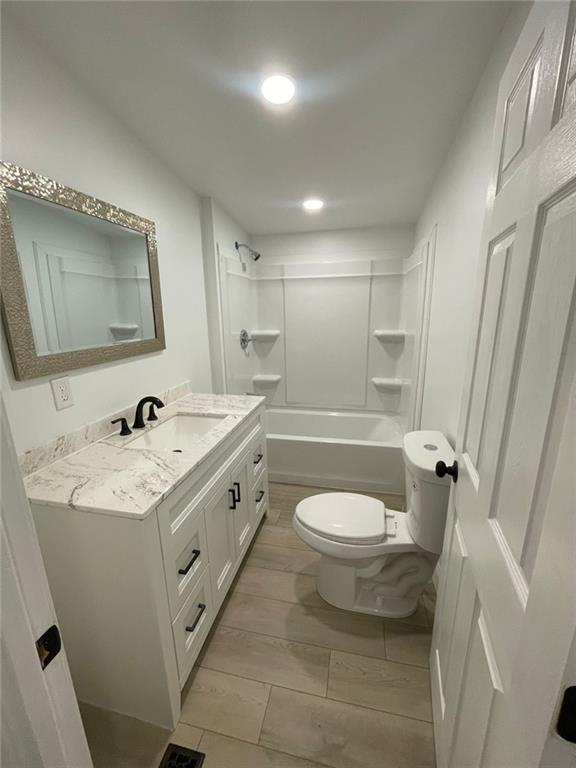 906 Jefferson River Road Jefferson, GA 30549 - Photo 11 of 25 a spacious bathroom with a granite countertop sink toilet and shower