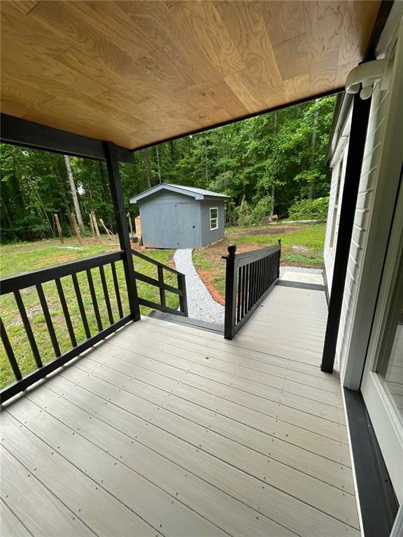 906 Jefferson River Road Jefferson, GA 30549 - Photo 3 of 25 a view of a patio with wooden floor