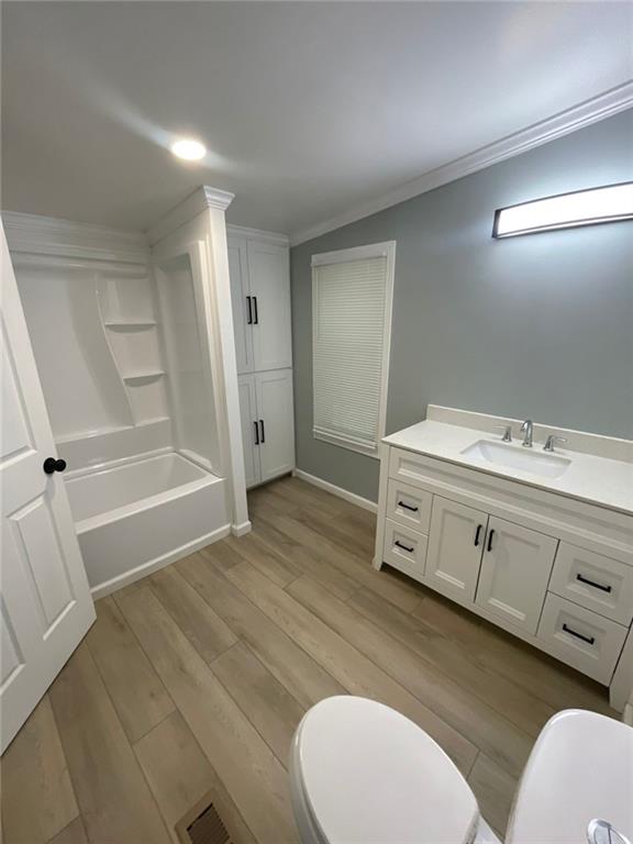 906 Jefferson River Road Jefferson, GA 30549 - Photo 10 of 25 a bathroom with a sink a toilet and shower