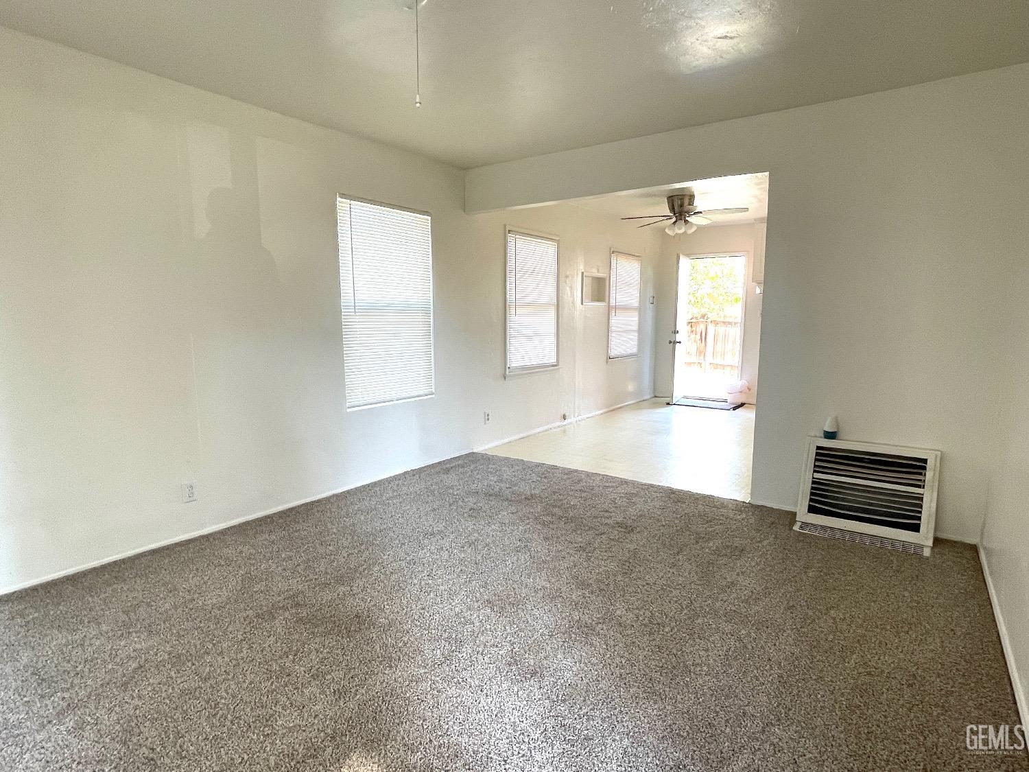 Undisclosed Address Bakersfield, CA 93304 - Photo 12 of 17 an empty room with windows