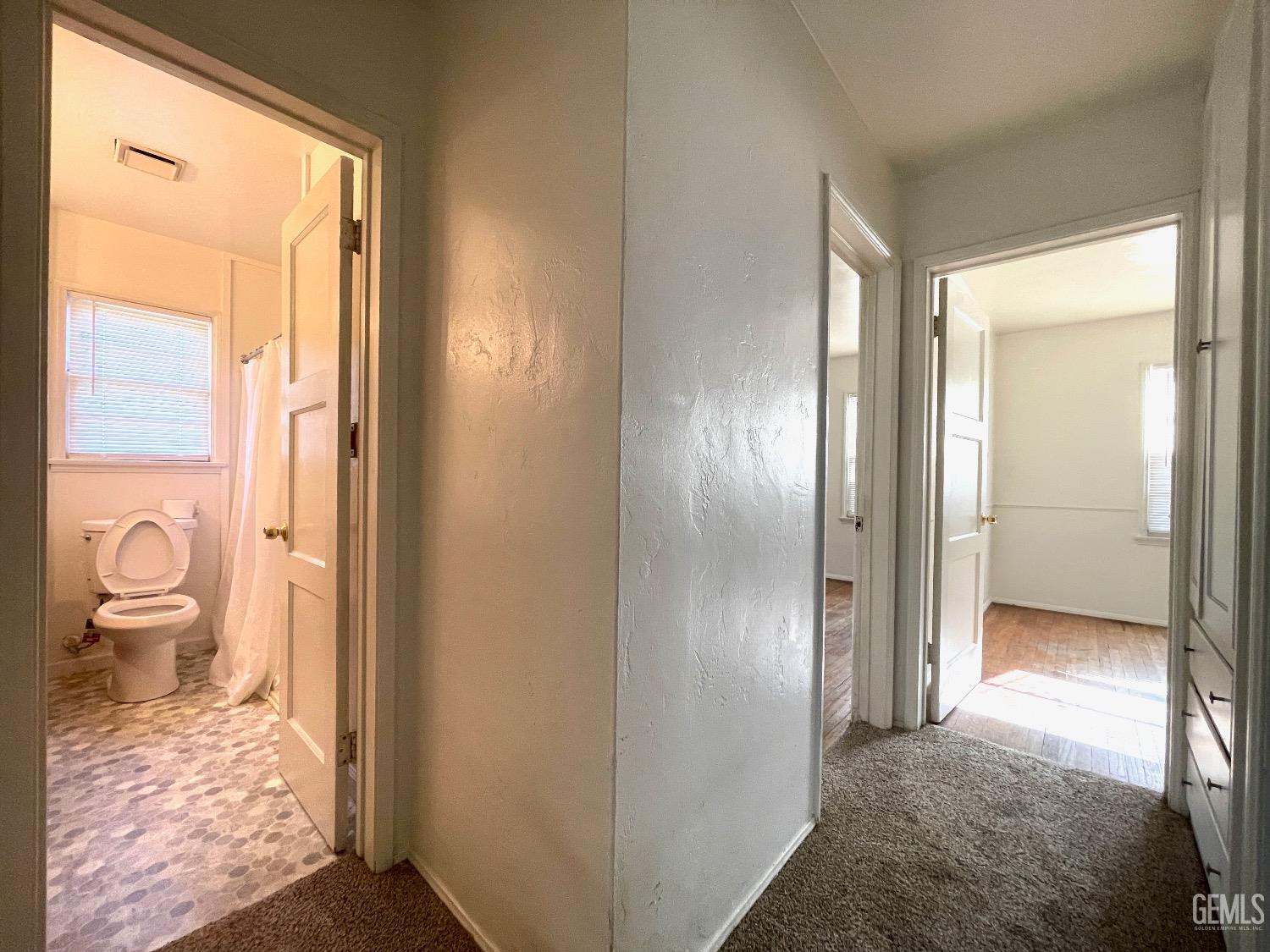 Undisclosed Address Bakersfield, CA 93304 - Photo 14 of 17 a view of a bathroom from a hallway