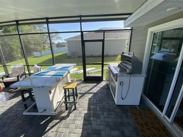a spacious bedroom with a bed and window