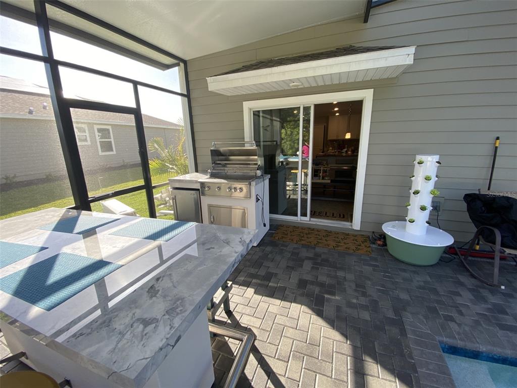 5686 Alenlon Way Mount Dora, FL 32757 - Photo 23 of 62 a room with furniture and a window